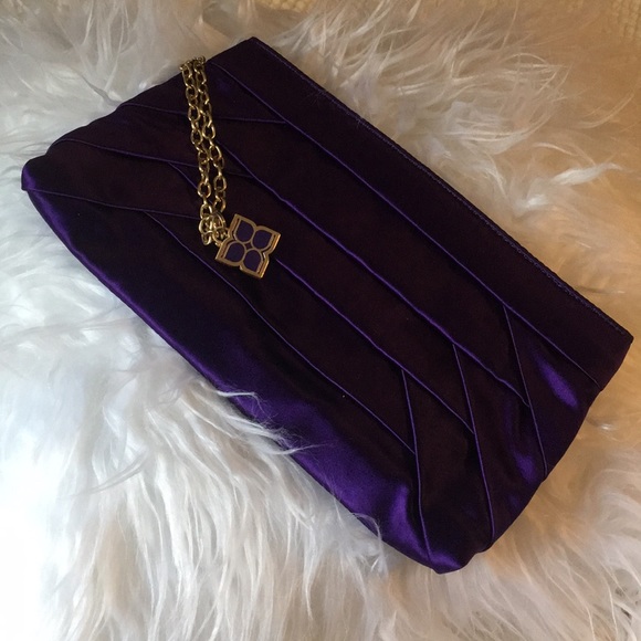BCBGMaxAzria Handbags - BCBGMAXAZRIA Purple satin clutch EUC